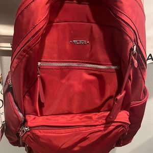 Authentic Tumi red backpack